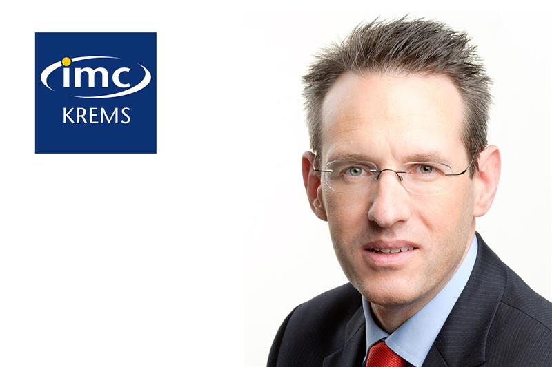 Michael Bartz mit IMC Logo